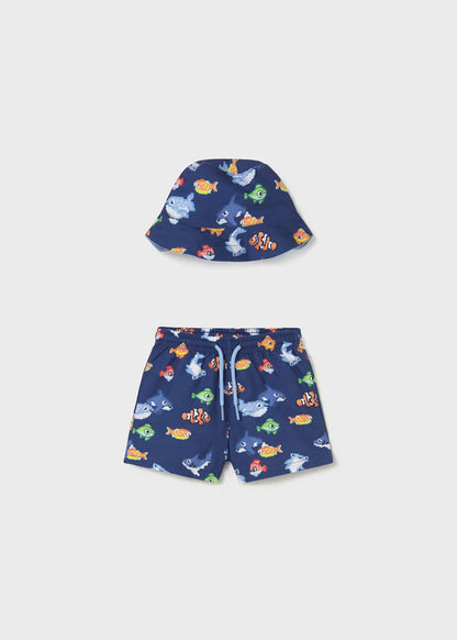 Conjunto traje de baño y gorro reversible protección solar bebé